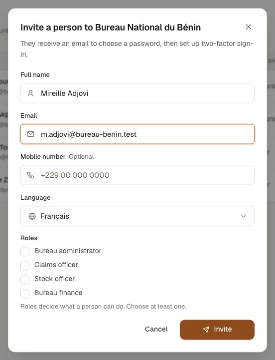 The Invite a person dialog with name, email, language and role choices
